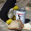P1000315.JPG -- Tux also enjoyed a break with Sake, bread, and cheese!